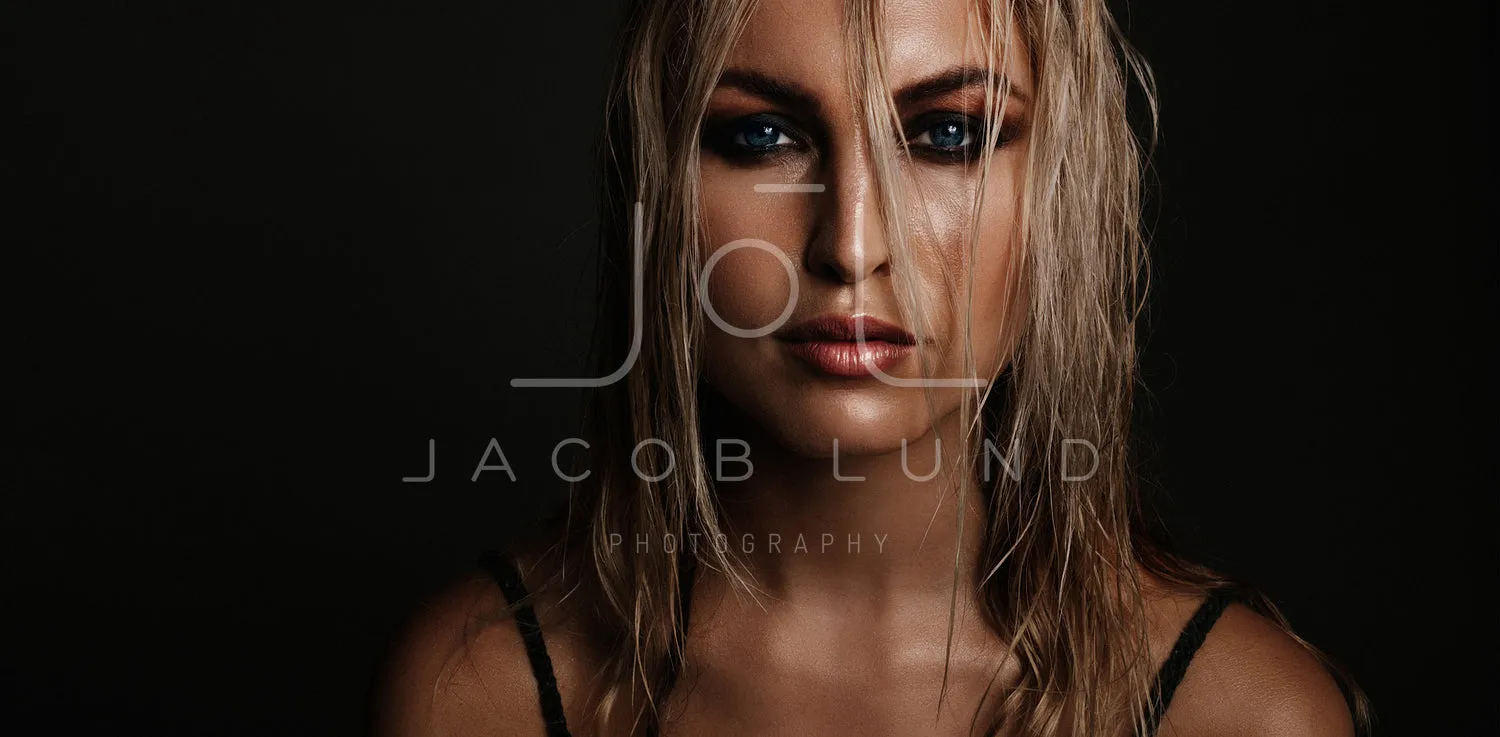 Beautiful young woman with wet look makeup