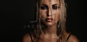 Beautiful young woman with wet look makeup